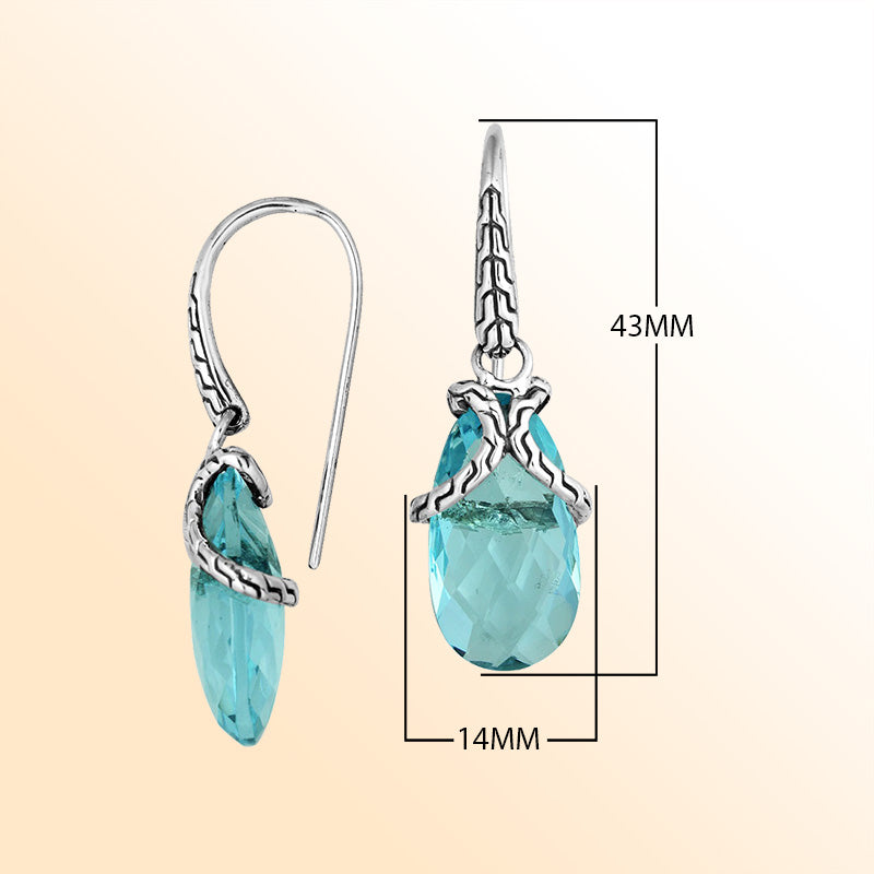 Sterling silver earrings with Blue Topaz Quartz elongated drop design and woven silver detailing.