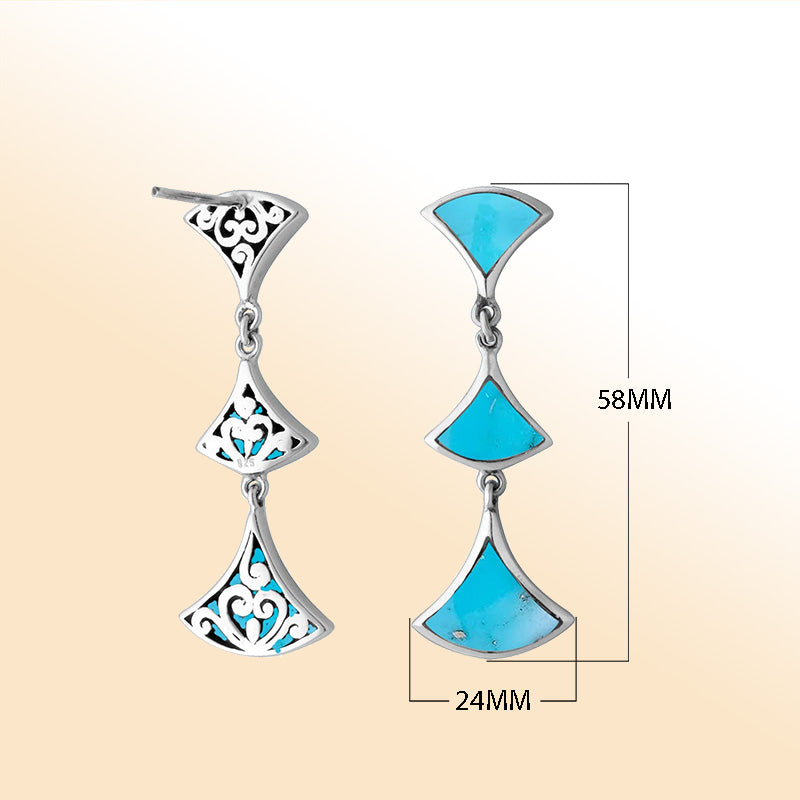 Sterling silver Turquoise Shell drop earrings with filigree accents and post clip lock.