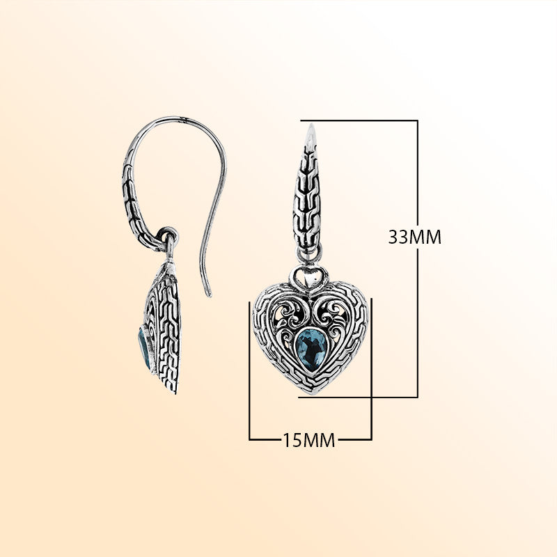 Sterling silver heart earrings with Blue Topaz Quartz and ornate filigree accents.