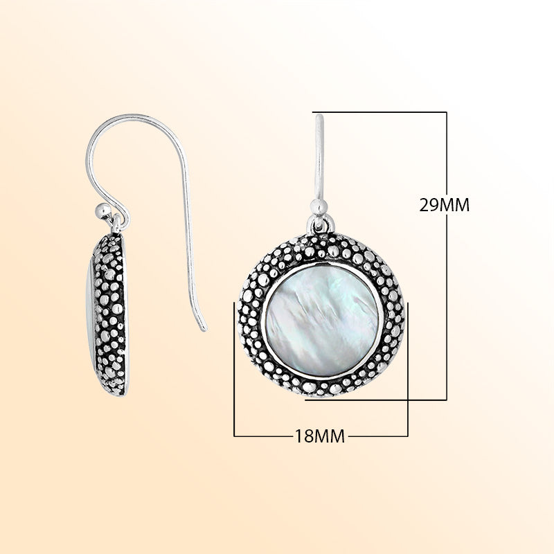 Sterling silver round earrings with Mother Of Pearl and oxidized artisan dotted design.
