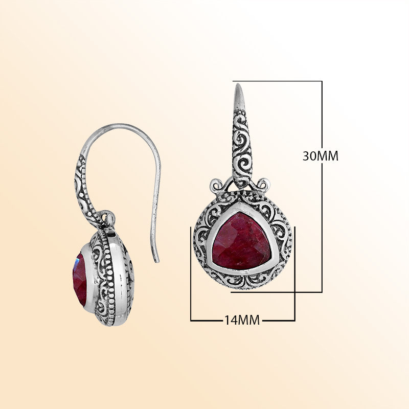 Handcrafted Sterling Silver Earrings With Faceted Ruby Triangle And Ornate Bali Scroll Art Detailing For Elegant Wear
