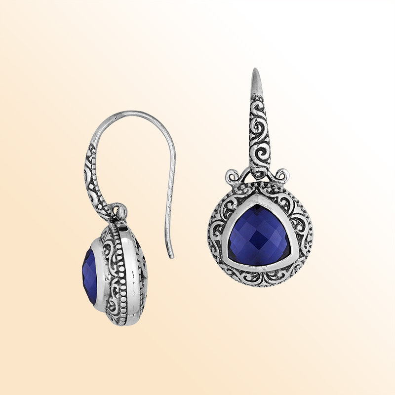 Retail sterling silver sapphire drop earrings with ornate Balinese handcrafted scroll detailing.