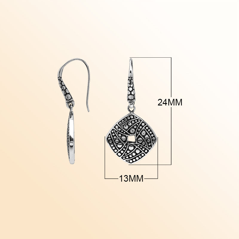 Handcrafted Balinese Sterling Silver Carved Diamond-Shaped Dangle Earrings With Dot And Swirl Pattern Detailing
