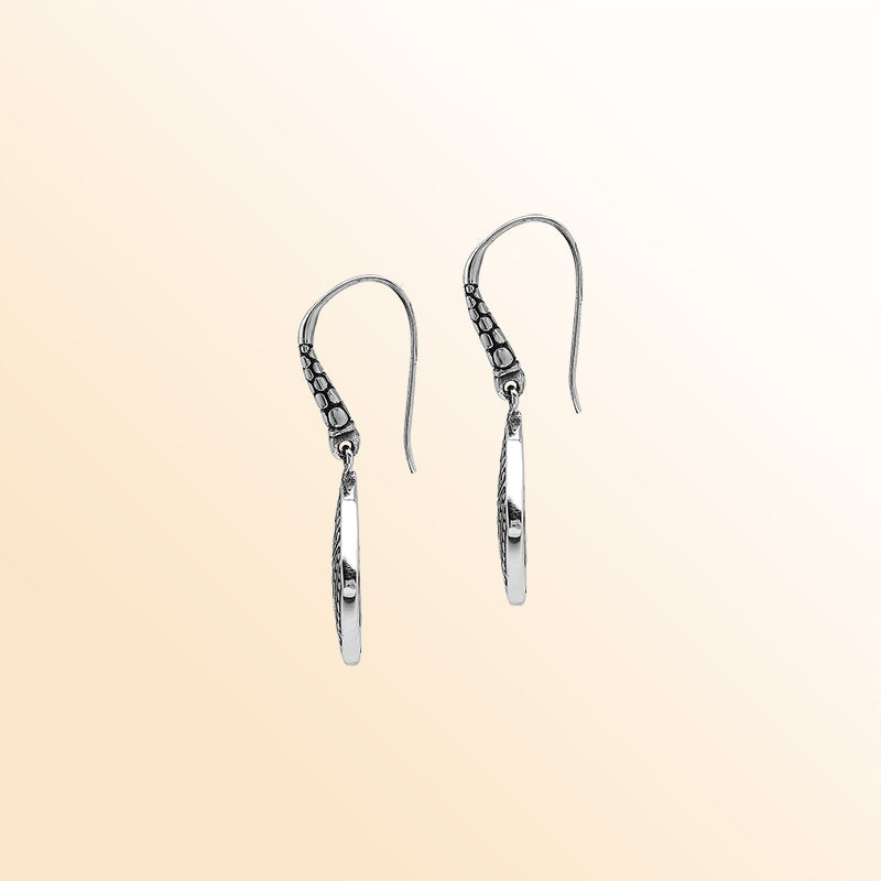 Handcrafted Balinese Sterling Silver Carved Diamond-Shaped Dangle Earrings With Dot And Swirl Pattern Detailing