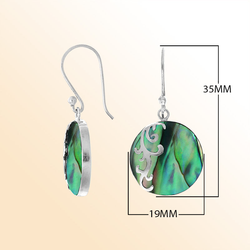 Sterling silver artisan earrings showcasing vibrant round abalone shell with a flowing wave-style overlay, crafted to evoke an expressive ocean-inspired look for elegant everyday wear.