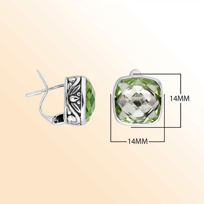 Sterling silver artisan earrings featuring cushion-cut green amethyst quartz with ornate Balinese-inspired metalwork, crafted to offer expressive elegance and comfortable everyday wear with secure omega clip closure.