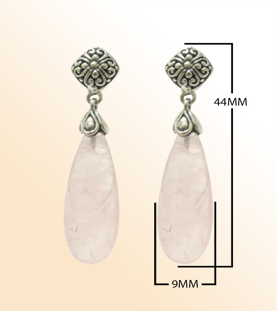 Sterling silver earrings featuring soft pink Rose Quartz teardrops paired with ornate Bali-style tops, crafted for consistent quality and elegant presentation in wholesale jewelry assortments.