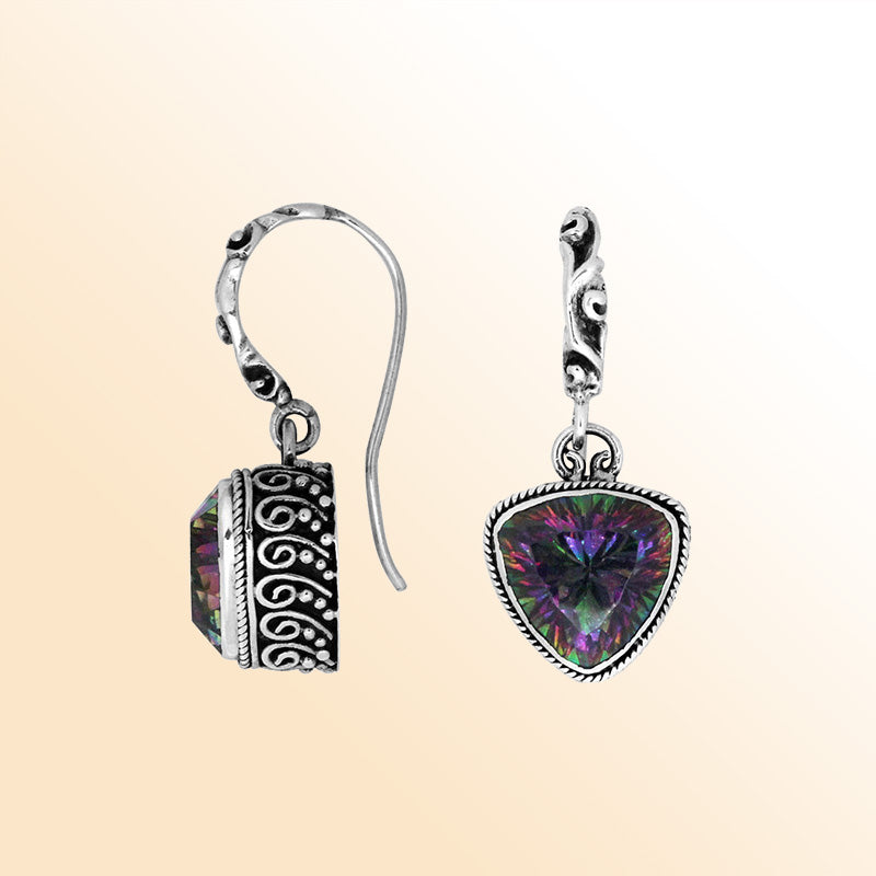 Sterling silver earrings featuring a vibrant triangular Mystic Quartz stone enhanced by carved detailing and earwire lock, offering bold color shifts and artistic handcrafted charm for everyday wear.