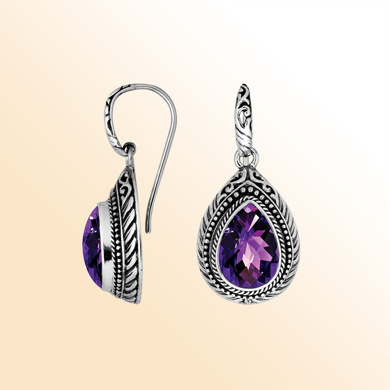 Sterling silver Amethyst Quartz teardrop earrings with handcrafted carved silver frame, decorative bead accents, antique-polished finish, and graceful earwire hooks designed for elegant everyday wear.