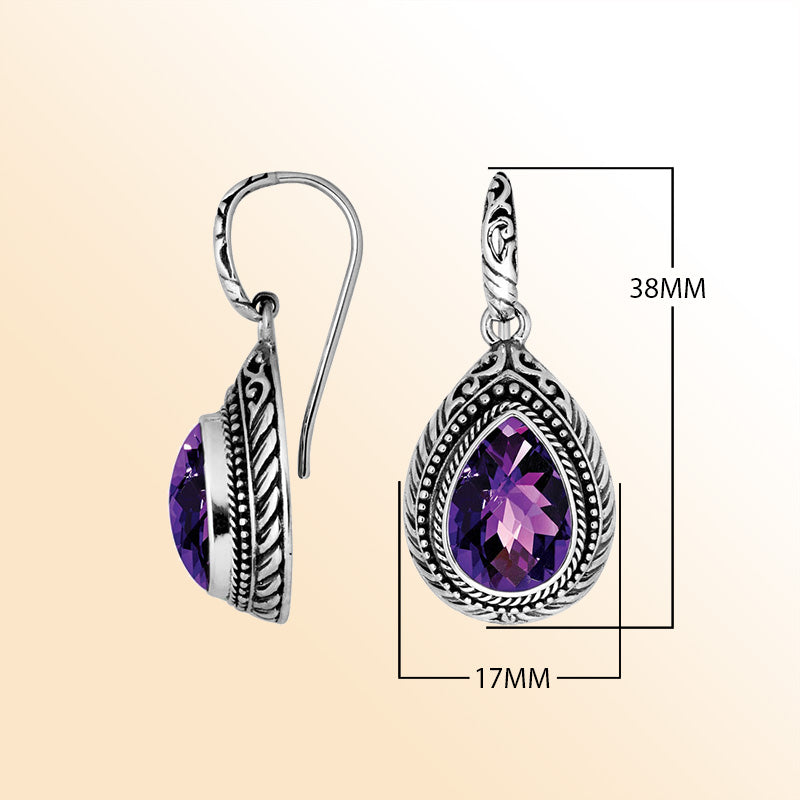 Sterling silver Amethyst Quartz teardrop earrings with handcrafted carved silver frame, decorative bead accents, antique-polished finish, and graceful earwire hooks designed for elegant everyday wear.