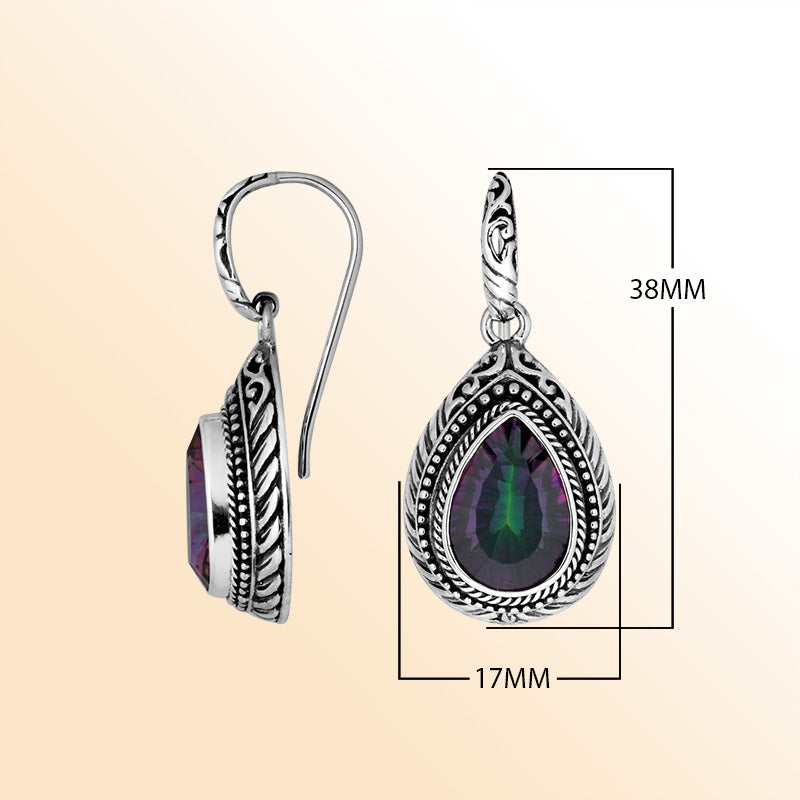 Sterling silver Mystic Quartz teardrop earrings with handcrafted carved silver frame, decorative bead accents, antique-polished finish, and elegant earwire hooks designed for refined everyday and special occasion wear.