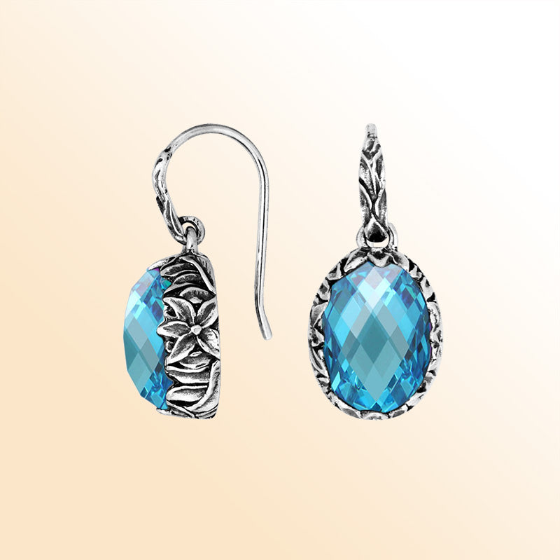Sterling silver Blue Topaz Quartz oval earwire earrings with handcrafted floral silver frame, antique-polished finish, vibrant blue stone accents, and elegant earwire hooks designed for refined everyday and special occasion wear.