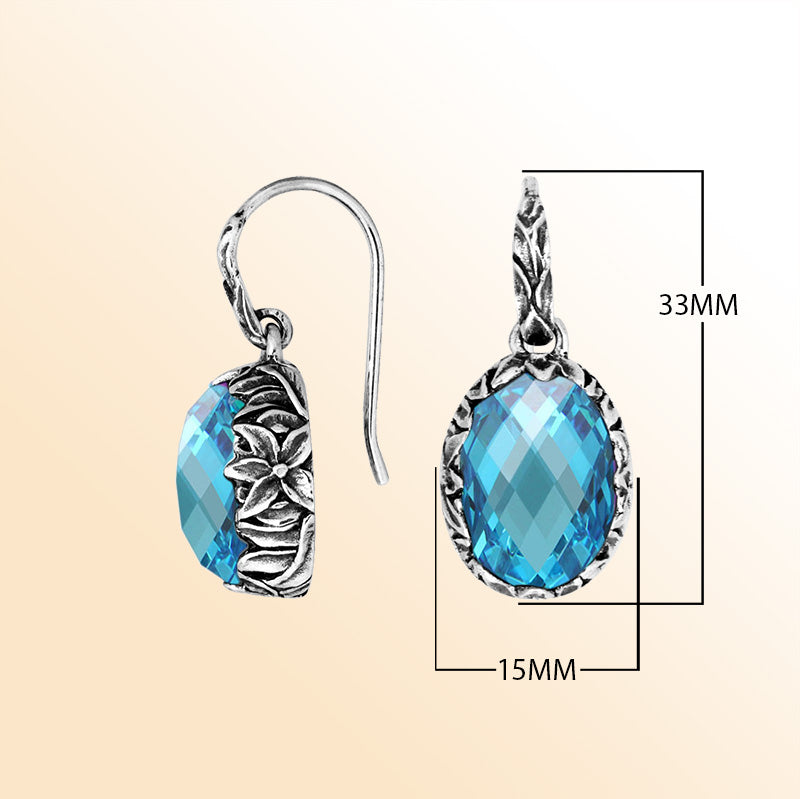 Sterling silver Blue Topaz Quartz oval earwire earrings with handcrafted floral silver frame, antique-polished finish, vibrant blue stone accents, and elegant earwire hooks designed for refined everyday and special occasion wear.