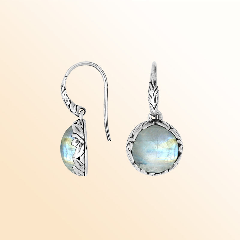 Sterling silver round earrings with Rainbow Moonstone and detailed oxidized silver craftsmanship.