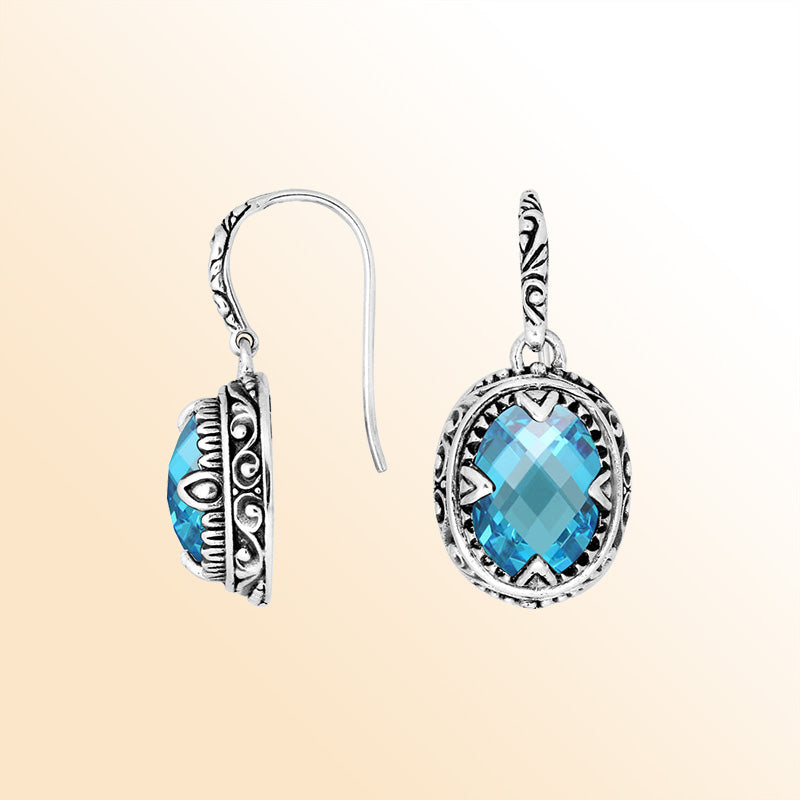 Sterling silver oval earrings with Blue Topaz Quartz and intricate oxidized silver craftsmanship.