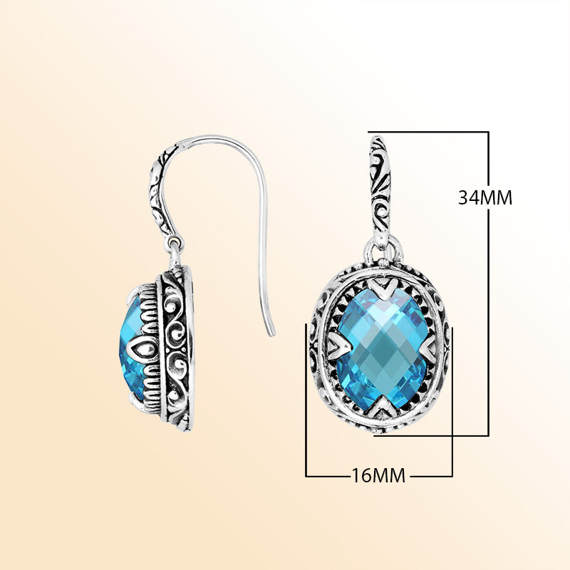 Sterling silver oval earrings with Blue Topaz Quartz and intricate oxidized silver craftsmanship.