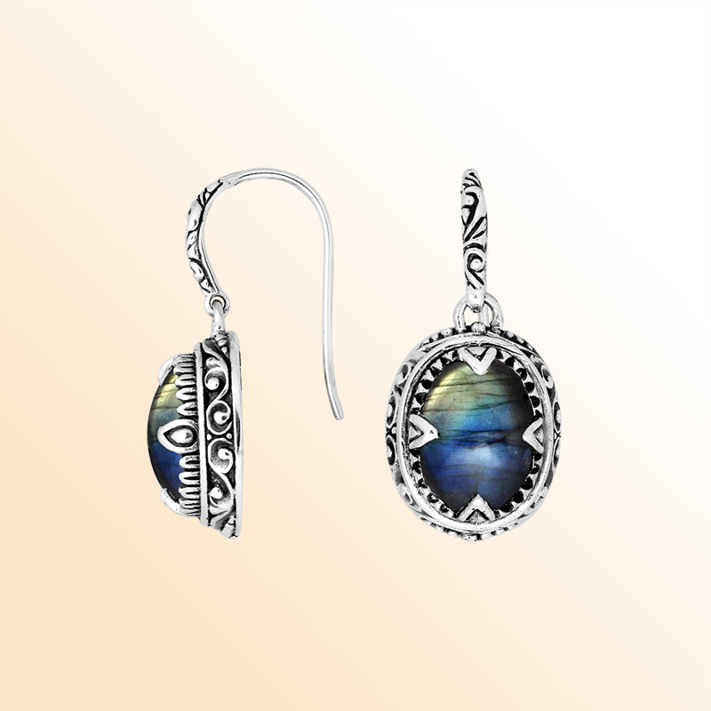 Sterling silver oval earrings with Labradorite and intricate oxidized silver craftsmanship.
