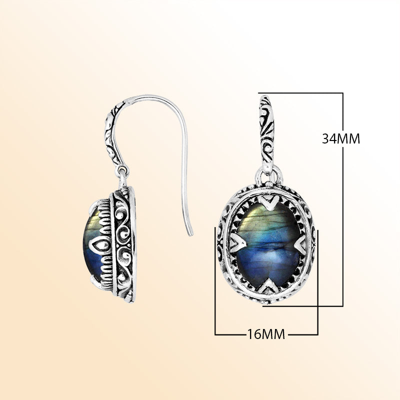 Sterling silver oval earrings with Labradorite and intricate oxidized silver craftsmanship.