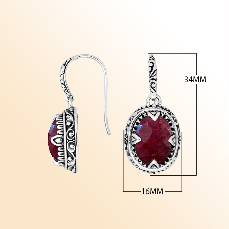 Sterling silver oval earrings with Ruby and intricate oxidized silver craftsmanship.