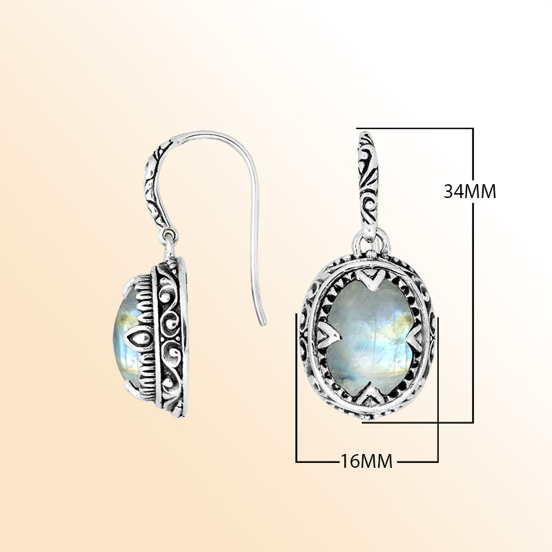 Sterling silver oval earrings with Rainbow Moonstone and intricate oxidized silver craftsmanship.