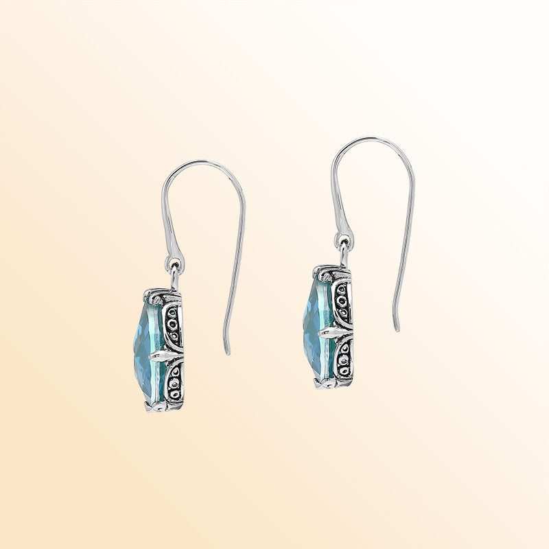 Sterling Silver Blue Topaz Quartz Teardrop Ocean Glow Earrings With Balinese Handcrafted Detailing.