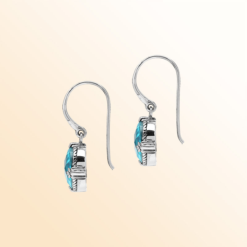 Sterling Silver Blue Topaz Quartz Oval Ocean Radiance Earrings With Balinese Handcrafted Detailing.