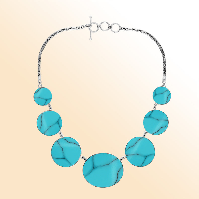 Women’s sterling silver necklace with turquoise shell discs and Bali-inspired accents.
