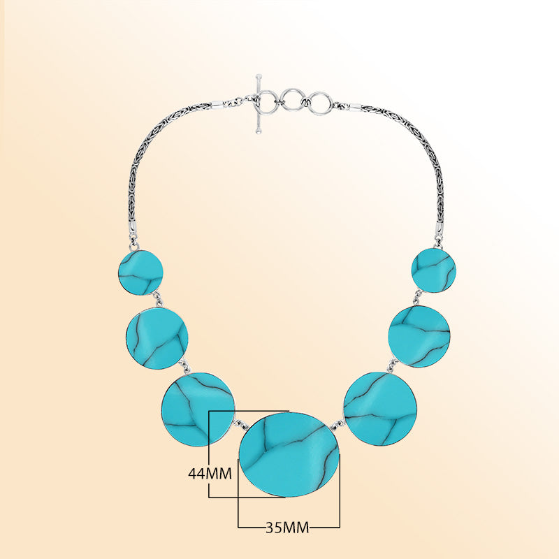 Women’s sterling silver necklace with turquoise shell discs and Bali-inspired accents.