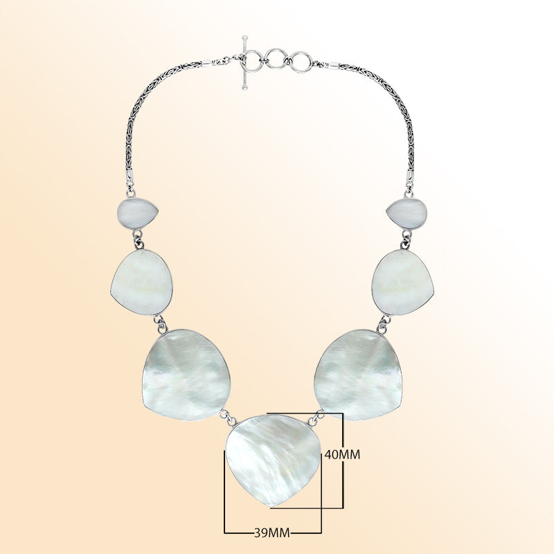 Women’s sterling silver necklace with heart-shape Mother of Pearl stones and Bali-inspired accents.