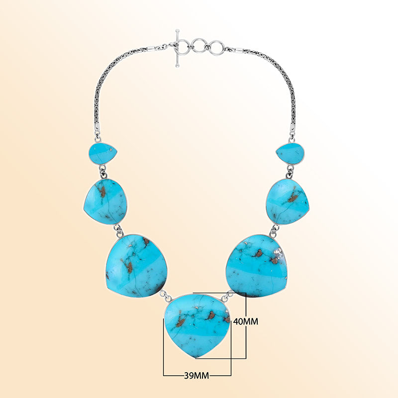 Women’s sterling silver necklace with heart-shape turquoise shell stones and Bali-inspired accents.