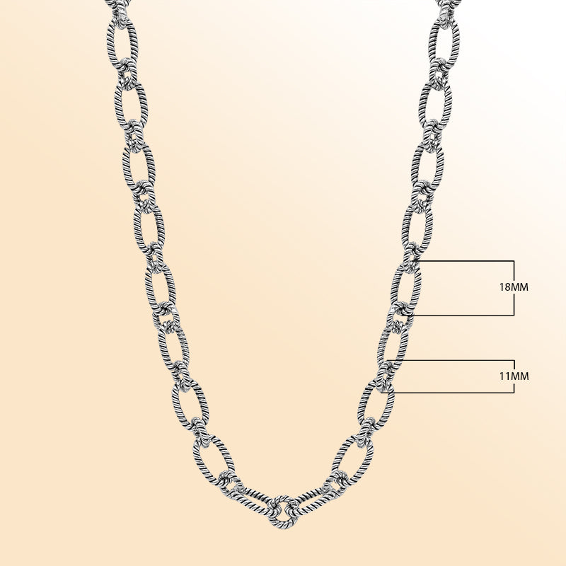 Handcrafted sterling silver rope link chain necklace with toggle clasp.