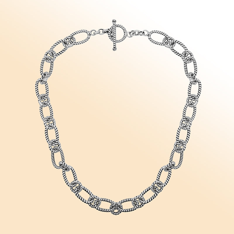 Handcrafted sterling silver rope link chain necklace with toggle clasp.