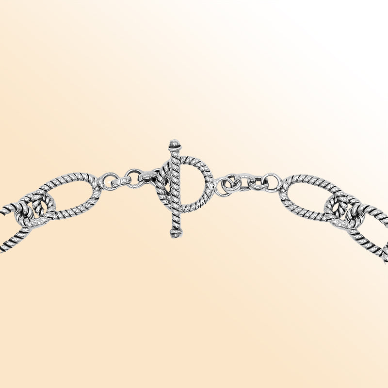 Handcrafted sterling silver rope link chain necklace with toggle clasp.