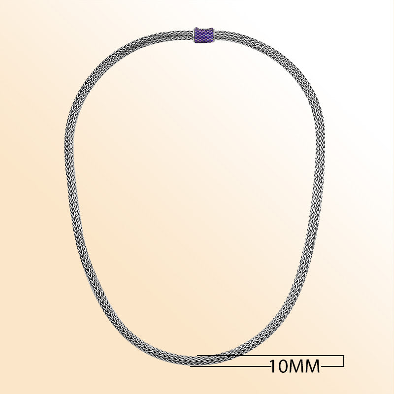 Handmade sterling silver woven chain necklace with blue topaz quartz centerpiece, artisan jewelry from Bali