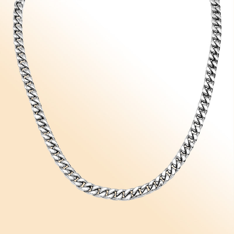 Sterling silver Cuban link chain necklace with black cubic zirconia accent and bold polished links.
