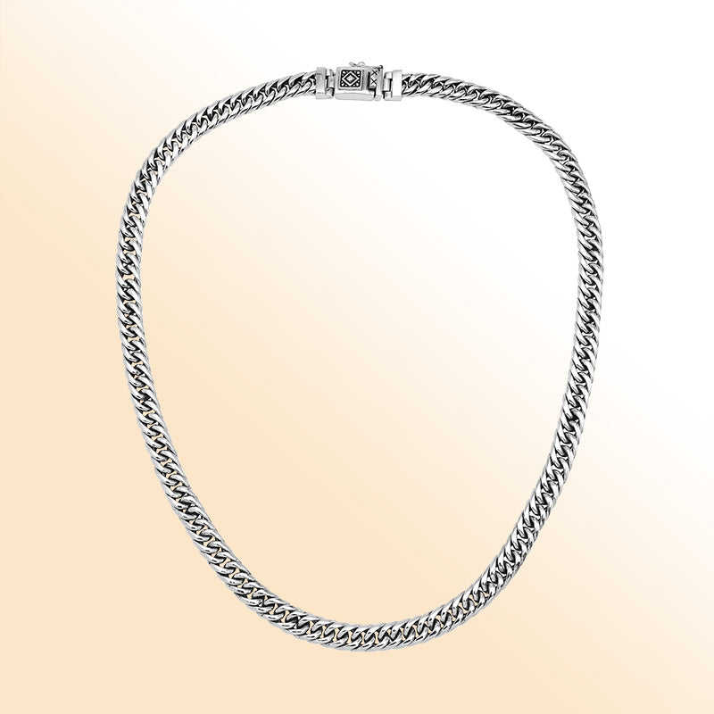 Handcrafted sterling silver woven chain necklace with detailed Balinese clasp, artisan jewelry from Bali.