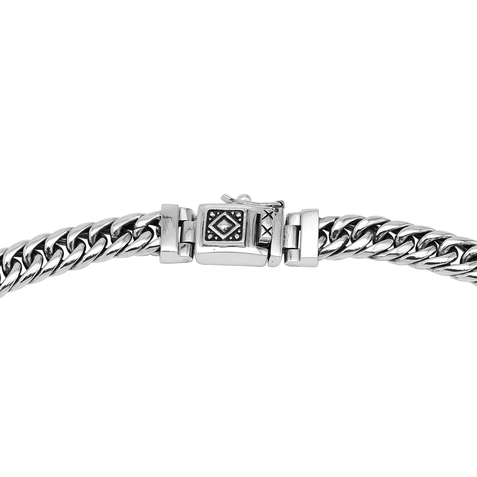 Handcrafted sterling silver woven chain necklace with detailed Balinese clasp, artisan jewelry from Bali.