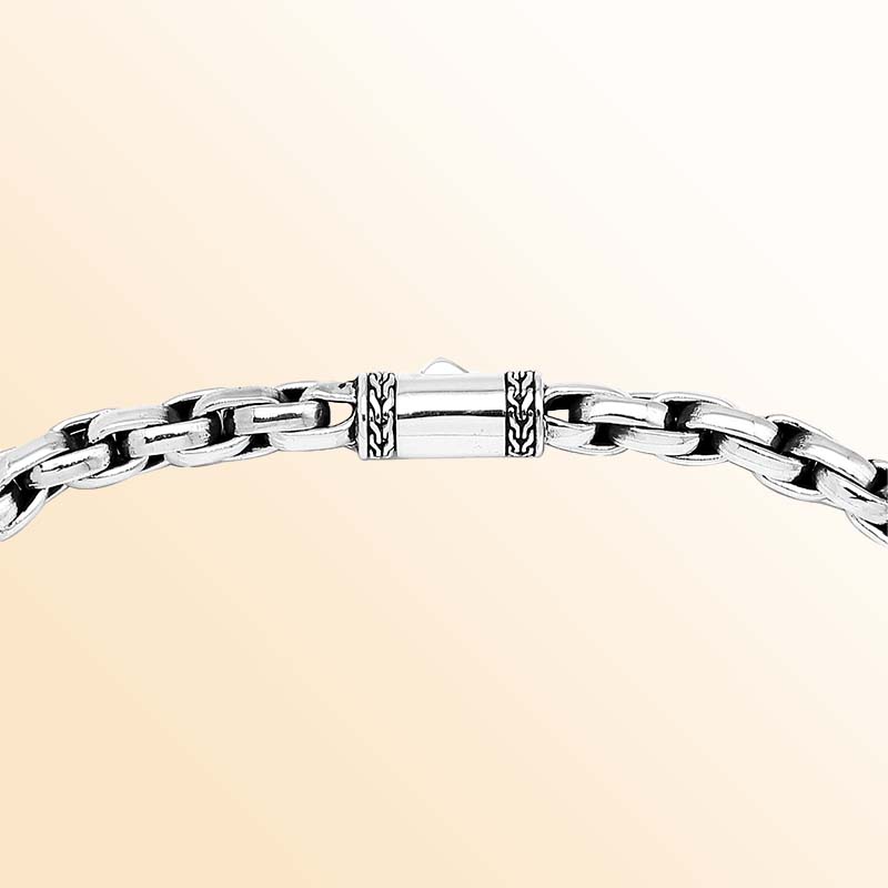 Artisan sterling silver necklace showcasing smooth rounded box links, luminous polished surfaces, subtle oxidized depth, and a refined decorative push clasp.