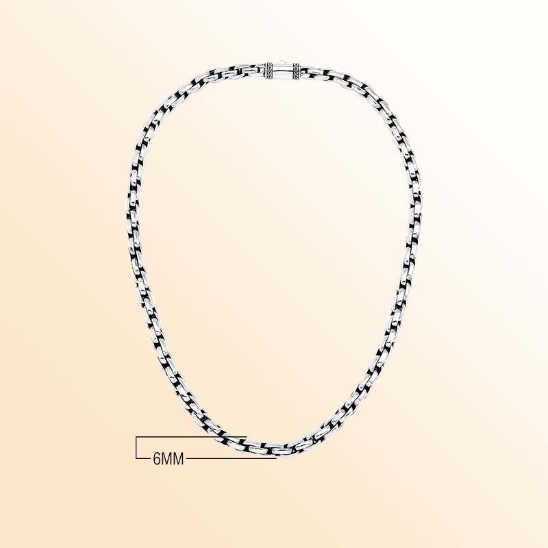 Artisan sterling silver necklace showcasing smooth rounded box links, luminous polished surfaces, subtle oxidized depth, and a refined decorative push clasp.