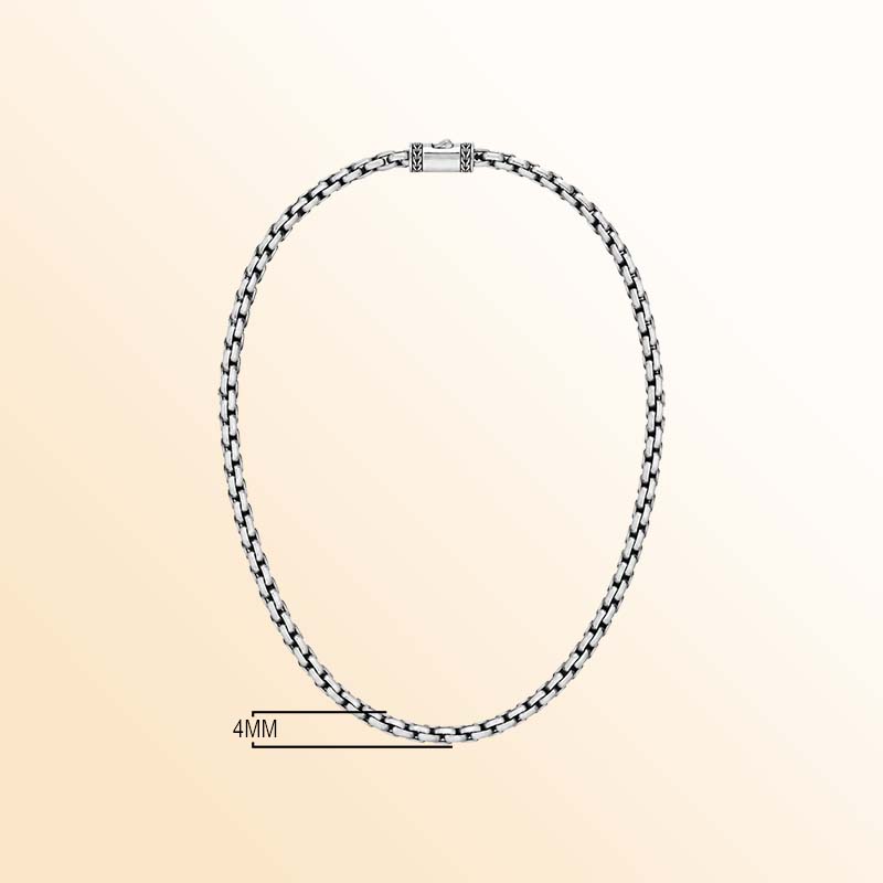 Bali-inspired sterling silver round box chain necklace with precisely connected geometric links, contrasting oxidized accents, polished silver highlights, and an artisan push clasp.