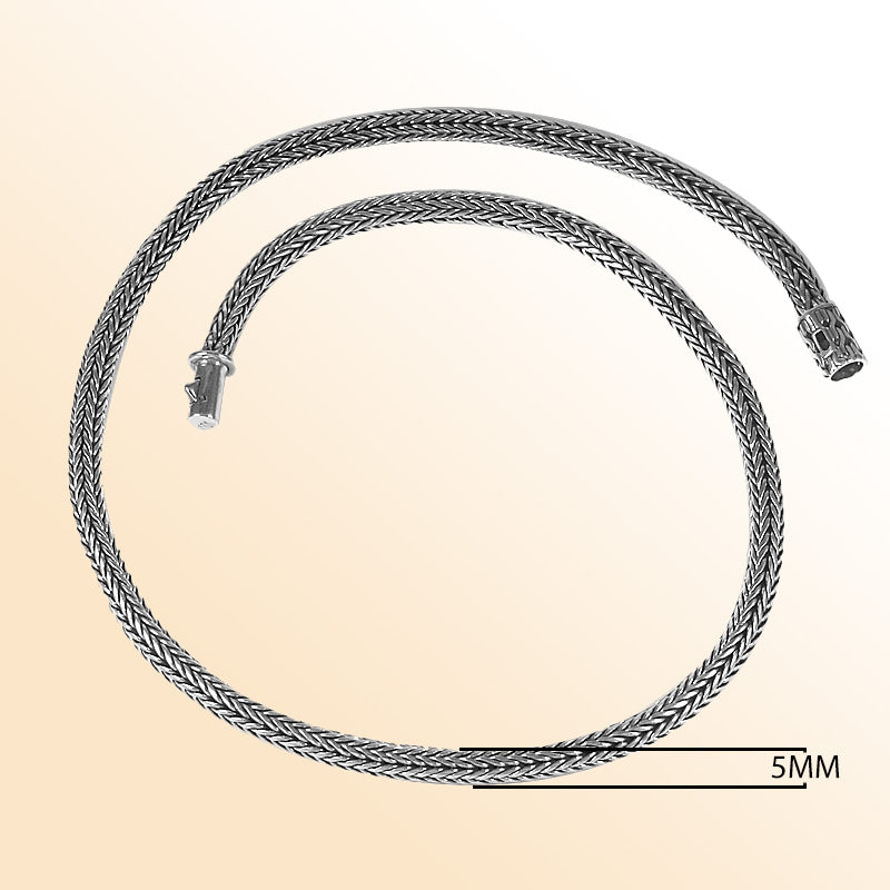 Handcrafted sterling silver wheat chain necklace with woven design and artisan clasp, made in Bali.
