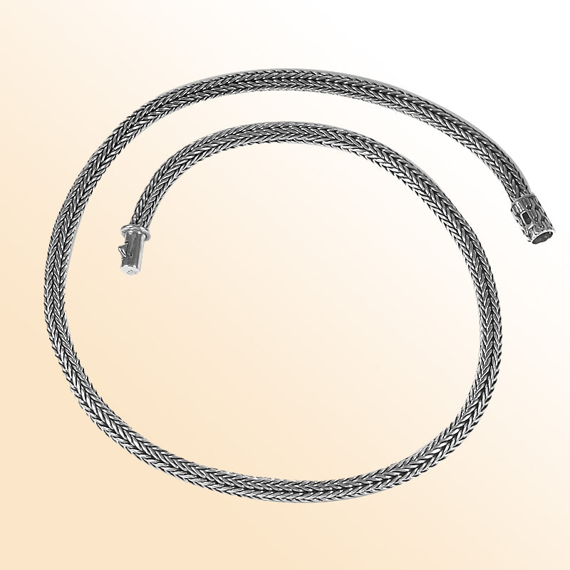 Handcrafted sterling silver wheat chain necklace with woven design and artisan clasp, made in Bali.