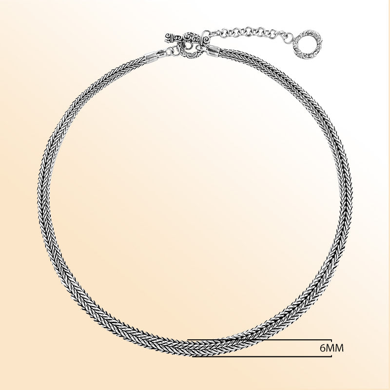 Handcrafted sterling silver wheat chain necklace with polished-oxidized finish and artisan clasp, made in Bali.