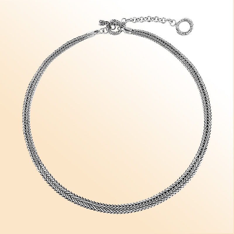 Handcrafted sterling silver wheat chain necklace with polished-oxidized finish and artisan clasp, made in Bali.