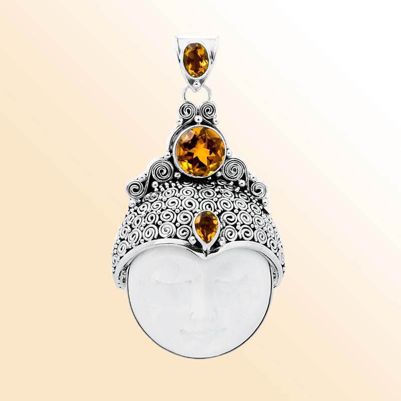 Sterling silver pendant with hand-carved white shell moon face and faceted Citrine Quartz, Bali scrollwork artisan jewelry for orders.
