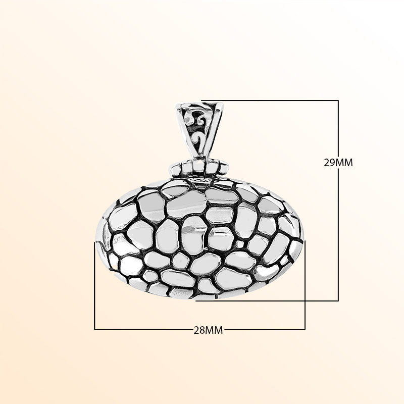 Sterling silver artisan oval pendant with polished pebbled texture handcrafted in Bali