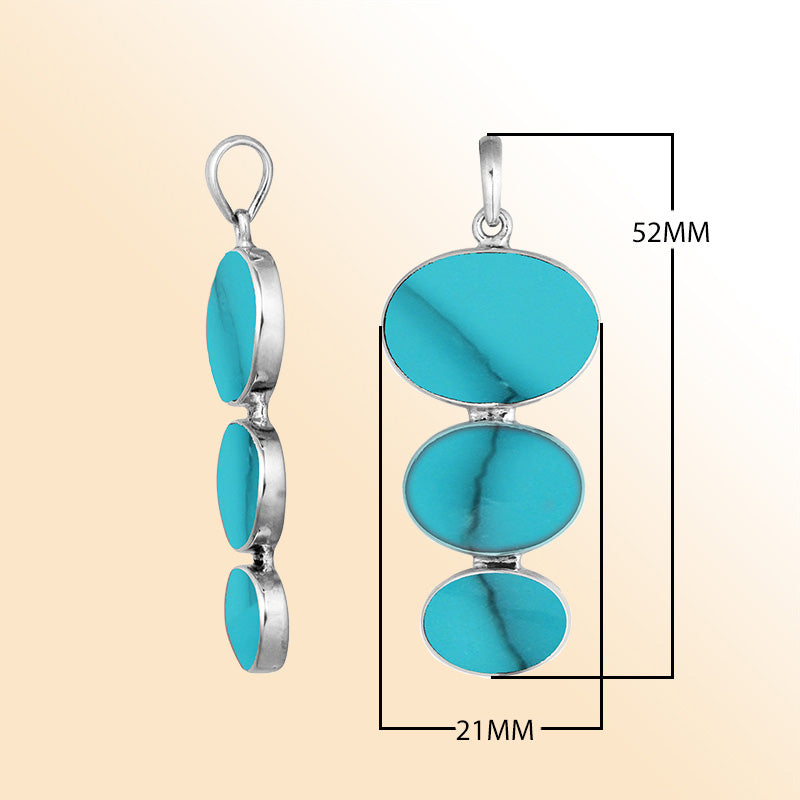 Handcrafted sterling silver pendant with three oval turquoise stones, vibrant blue-green artisan Bali jewelry.
