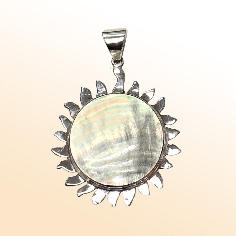 sterling silver sunburst pendant with round Jeping Shell, handcrafted in Bali artisan style.