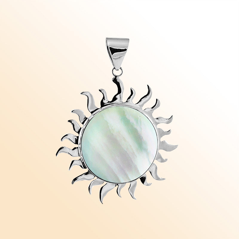 Handcrafted sterling silver sun pendant with luminous Mother of Pearl centerpiece, artisan Bali jewelry for elegant everyday style.
