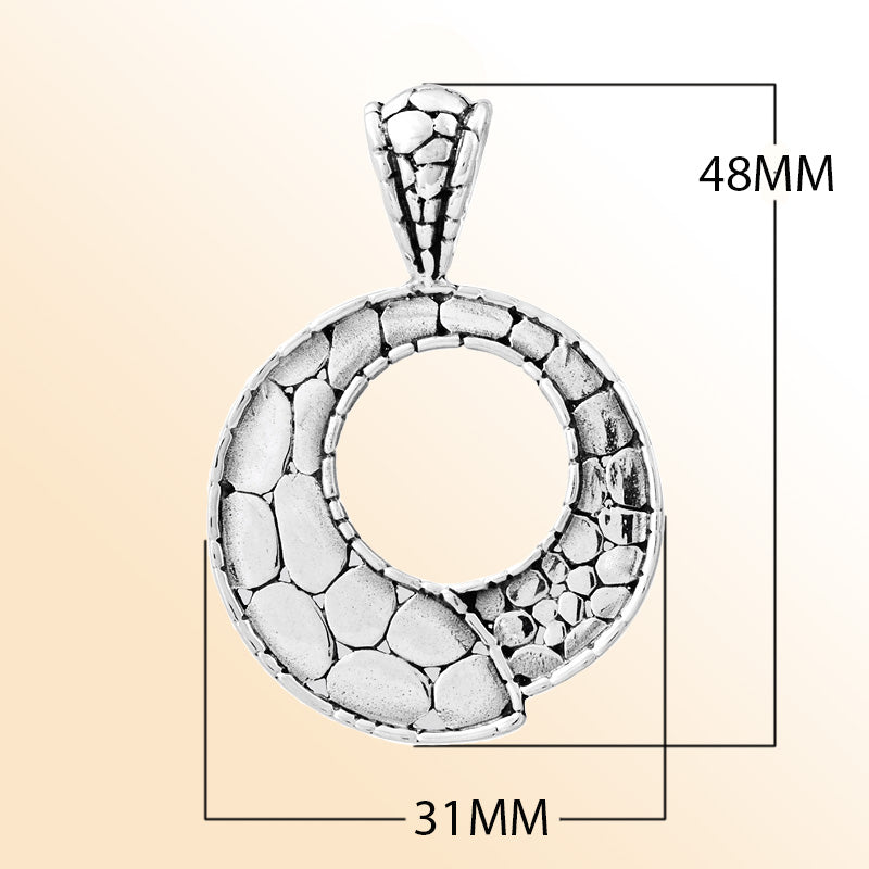 Handcrafted sterling silver round pendant with pebble-textured design and open circle center, artisan Bali jewelry for everyday elegance.